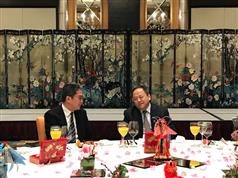 On arrival in Harbin yesterday (January 4), the Secretary for Development, Mr Michael Wong (left), attended a dinner hosted by the Mayor of Harbin, Mr Sun Ze, for visiting Hong Kong entrepreneurs.
