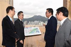 The Secretary for Development, Mr Michael Wong, visited Kowloon City District today (March 5). Photo shows Mr Wong (second right) being briefed by the Managing Director of the Urban Renewal Authority (URA), Mr Wai Chi-sing (first right), and the Director (Planning and Design) of the URA, Mr Wilfred Au (second left), on the latest redevelopment plan for Kowloon City. Looking on is the Chairman of the Kowloon City District Council, Mr Pun Kwok-wah (first left).
