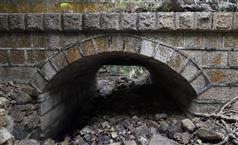 The Government today (May 22) announced that the Antiquities Authority (i.e. the Secretary for Development) has declared the masonry bridge of Pok Fu Lam Reservoir, the Tung Wah Coffin Home, and Tin Hau Temple and the adjoining buildings as monuments under the Antiquities and Monuments Ordinance. Photo shows a close-up view of the masonry bridge, which is neatly finished using granite copings with chamfered margins and reticulated surfaces.