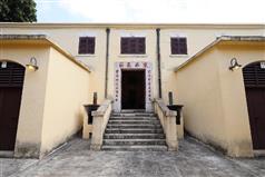 he Government today (May 22) announced that the Antiquities Authority (i.e. the Secretary for Development) has declared the masonry bridge of Pok Fu Lam Reservoir, the Tung Wah Coffin Home, and Tin Hau Temple and the adjoining buildings as monuments under the Antiquities and Monuments Ordinance. Photo shows the entrance of the Old Hall decorated with a granite door frame inscribed with the name “Tung Wah Coffin Home” in Chinese and a pair of couplets dating from 1924.