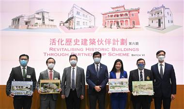 The Secretary for Development, Mr Michael Wong (centre); the Commissioner for Heritage, Mr Ivanhoe Chang (first right); and the Chairman of the Advisory Committee on Built Heritage Conservation, Professor Lau Chi-pang (third left), are pictured with representatives of successful applicants of Batch VI of the Revitalising Historic Buildings Through Partnership Scheme. The representatives are the Chairman of National History Education (Hong Kong) Limited, Mr David Ho (first left); the Chairman of Tianda Group, Mr Alan Fang (second left); the Director of Lifewire Foundation Limited, Ms Rita Pang (third right); and the Vice Chairperson of the Executive Committee of the Boys' Brigade, Hong Kong, Mr Wesley Lo (second right).