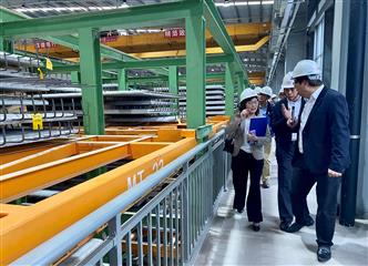 The Secretary for Development, Ms Bernadette Linn, today (April 24) visited Jiangmen and Zhuhai to inspect the operation and development of the Modular Integrated Construction (MiC) manufacturing bases in the area. Photo shows Ms Linn (first left) touring the factory of China State Construction Hailong Technology Company Limited in Zhuhai.