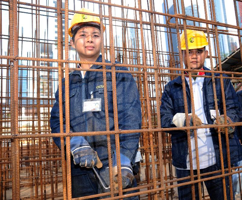 Mr Lau Chi-hung (right) and Mr Lee Ka-shun, trainees on the bar bender and fixer course, are optimistic about job prospect in the trade.
