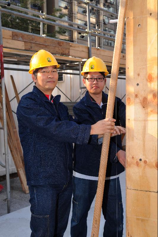 Trainees of the course on carpentry and aluminium formwork, Mr Yau Kwok-man (right) and Mr Vong Peng-vai, said the trade offers lots of job opportunities with the ongoing developments in the construction industry.